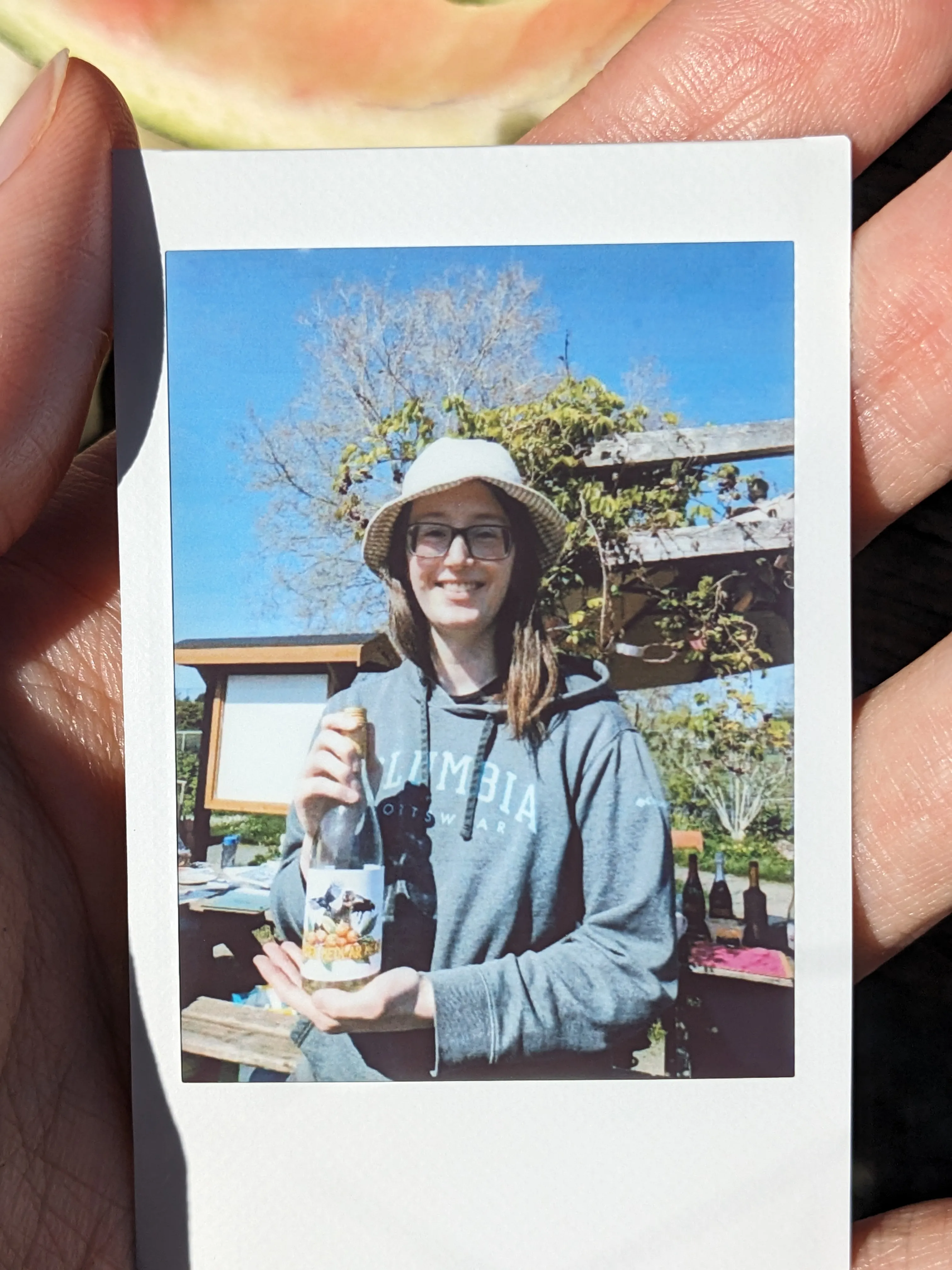 The author holding the (now-empty) bottle of medlar mead.